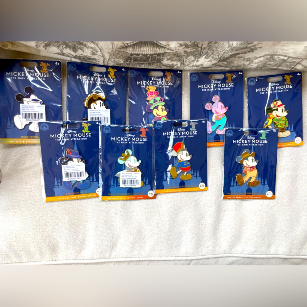 Disney main attraction pins - set of 9. Brand new.